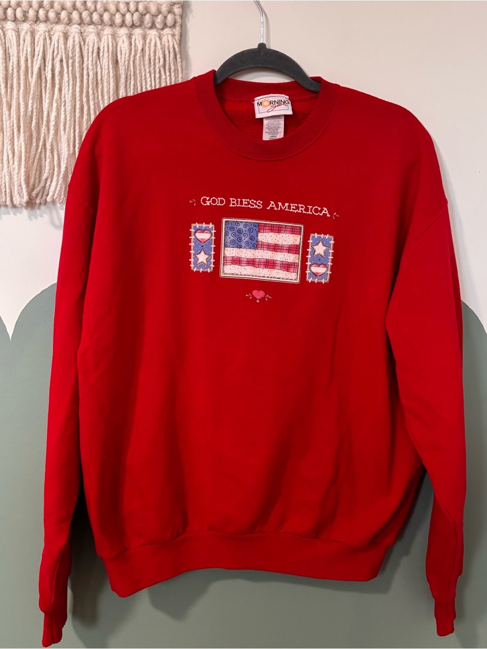 Vintage God Bless America crewneck sweatshirt with American flag graphic